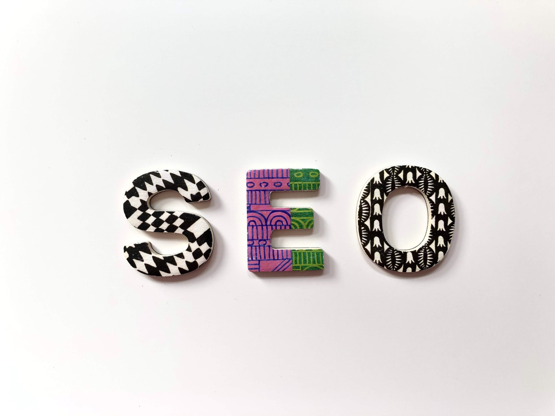 Colorful clay letters spelling "SEO" representing the power and meaning of search engine optimization.